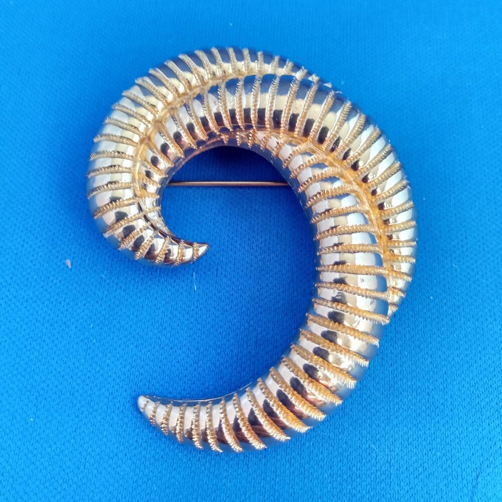 Vintage Monet golden spiral twist statement pin brooch